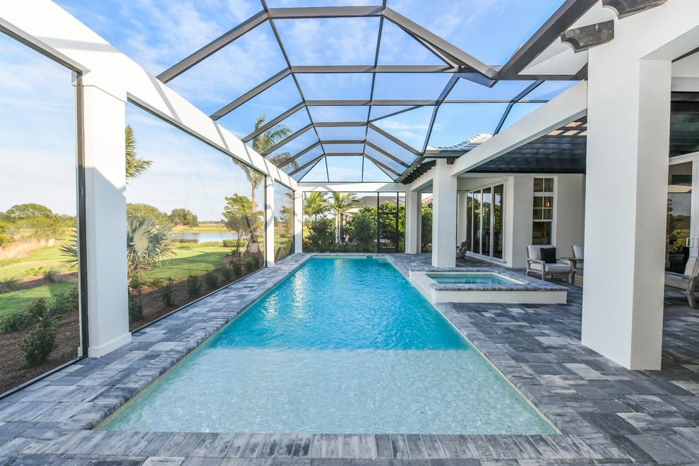 Transitional indoor rectangular lap pool in Tampa.