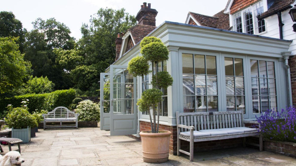 Design ideas for a large traditional sunroom in Kent.