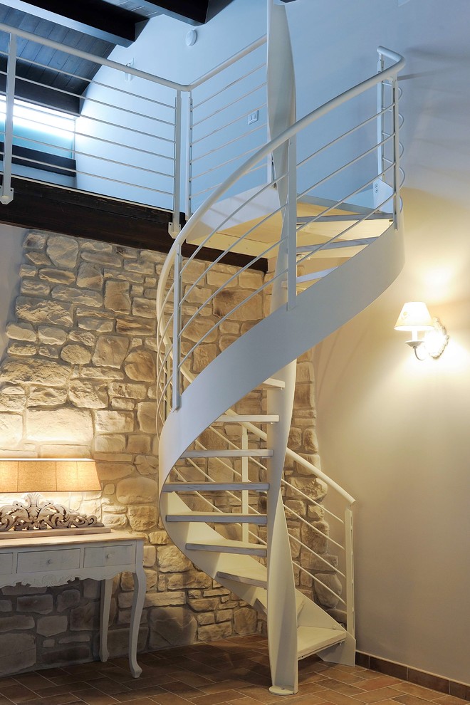 Photo of a small contemporary metal spiral staircase in Other.