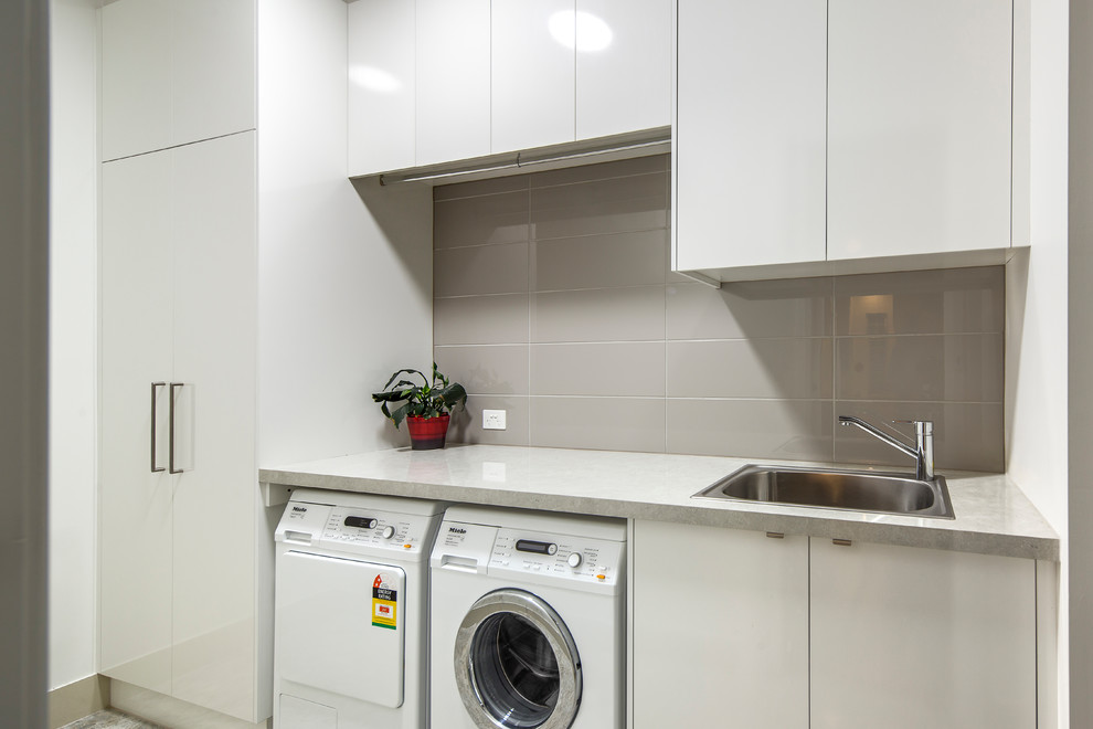 Inspiration for a contemporary laundry room in Adelaide.