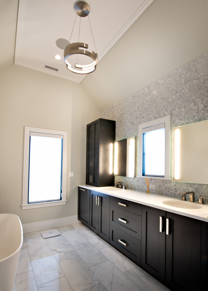 Inspiration for a mid-sized contemporary kids' porcelain tile, blue floor and double-sink bathroom remodel in Chicago with flat-panel cabinets, black cabinets, a two-piece toilet, white walls, an integrated sink, quartz countertops, white countertops and a built-in vanity