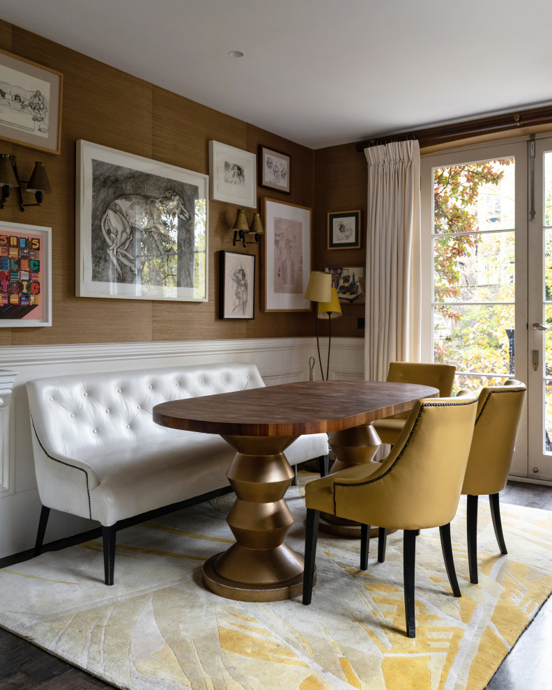 Inspiration for an eclectic dining room with brown walls, dark hardwood floors and brown floor.