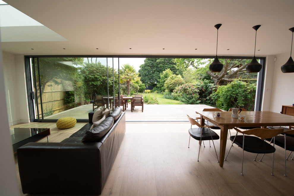 This is an example of a contemporary living room in Surrey.