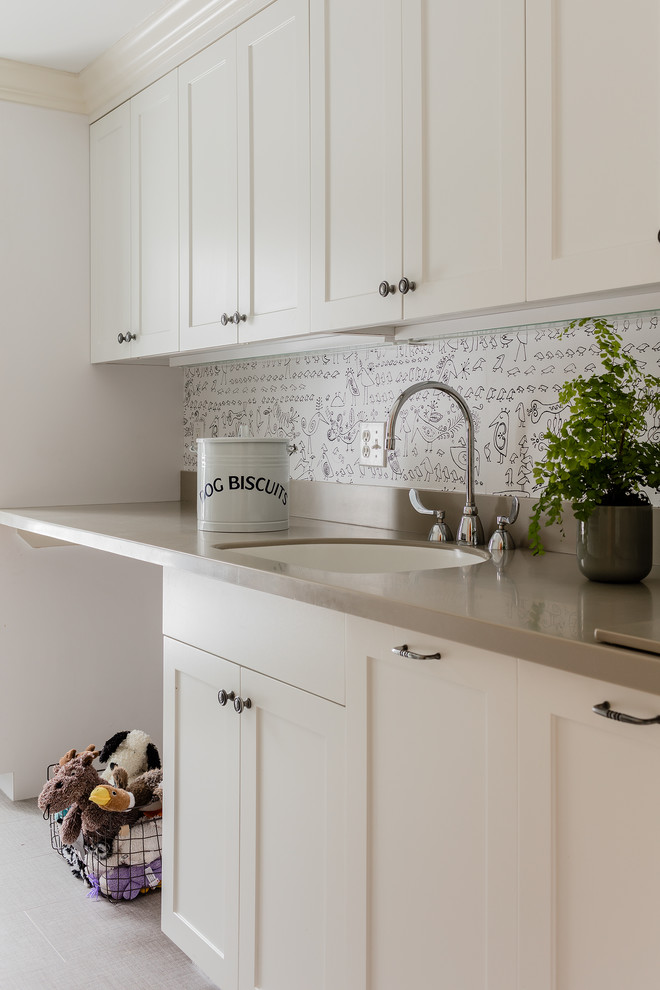 Example of a transitional home design design in Boston