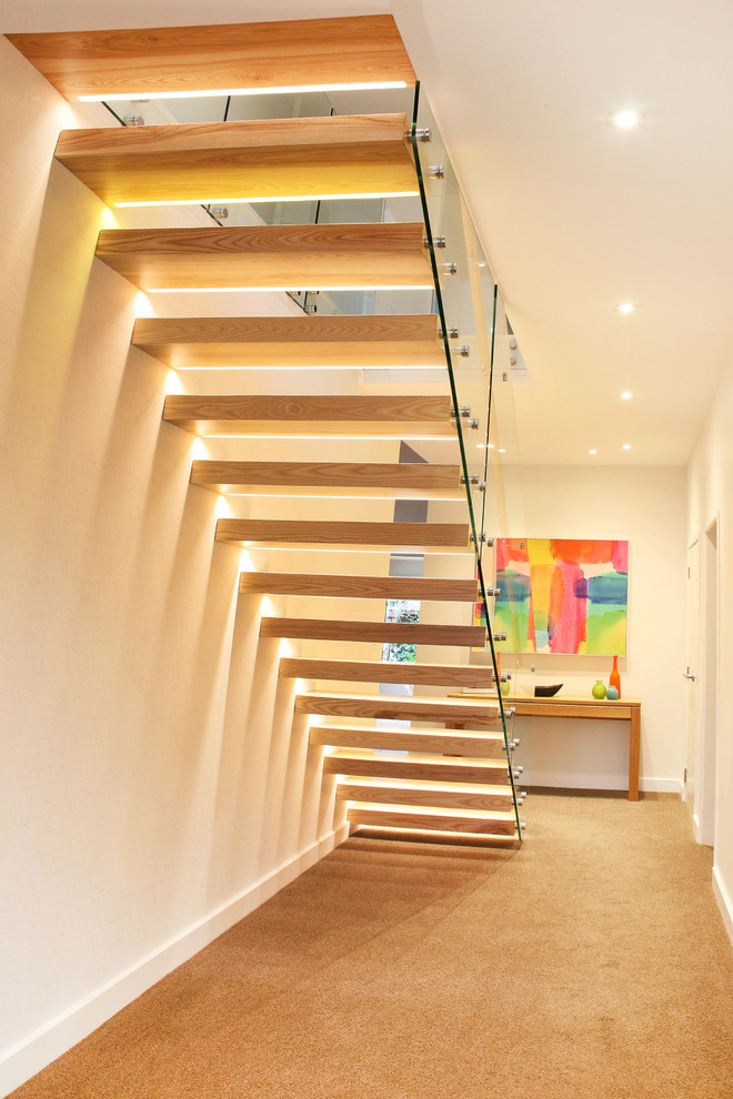 Scandinavian wood floating staircase in Wellington with open risers.