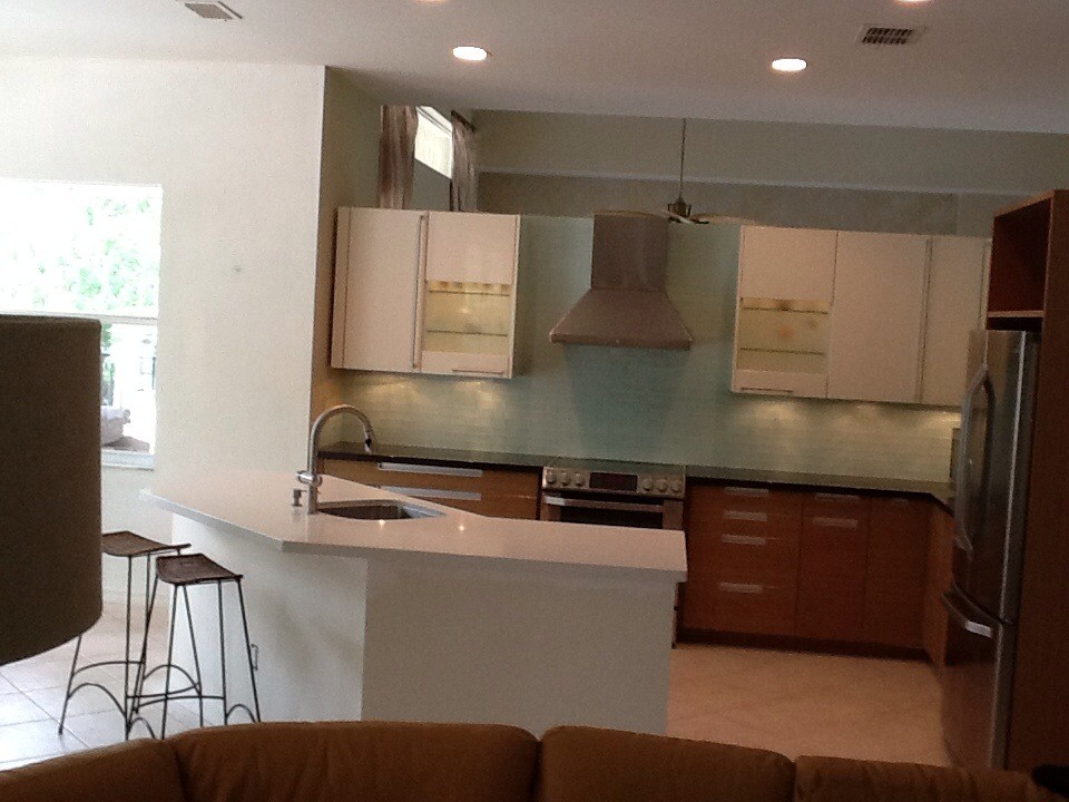 Example of a trendy kitchen design in Tampa