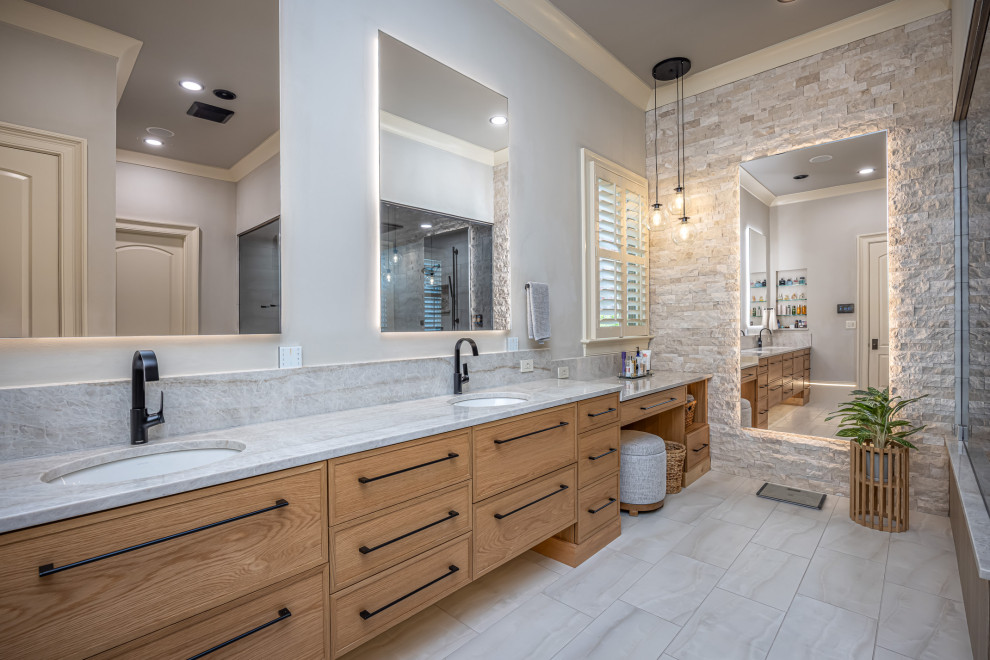 Inspiration for a transitional gray tile gray floor and double-sink bathroom remodel in Raleigh with shaker cabinets, medium tone wood cabinets, gray walls, an undermount sink, gray countertops and a built-in vanity