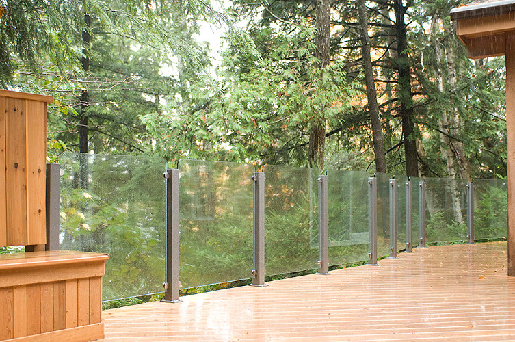 Example of a transitional home design design in Toronto