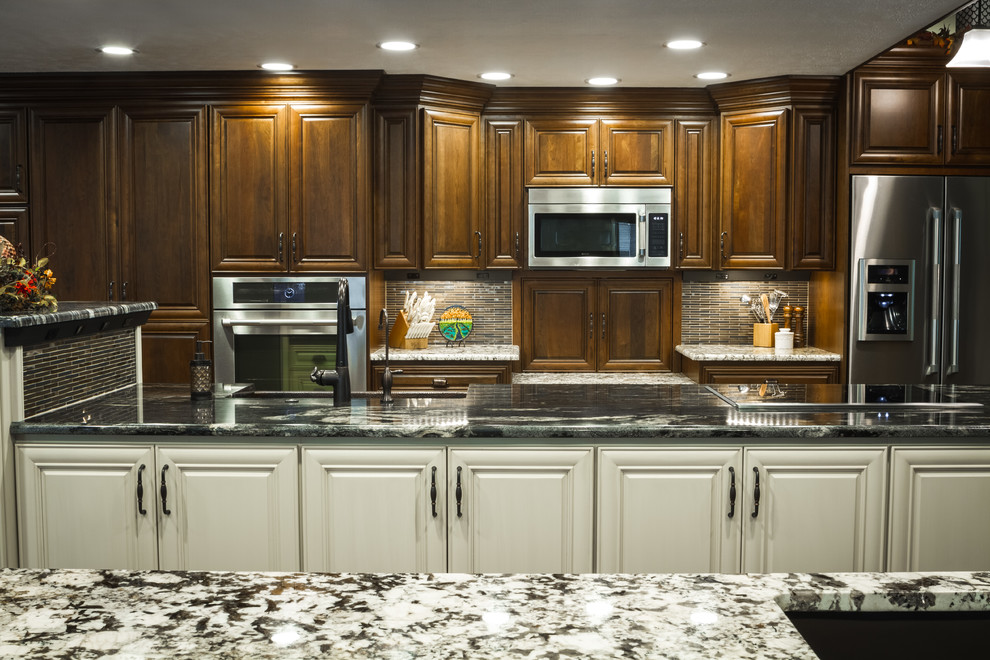 Inspiration for a large transitional l-shaped eat-in kitchen remodel with a farmhouse sink and two islands