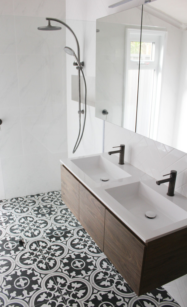 Photo of a small traditional 3/4 bathroom in Perth with flat-panel cabinets, white cabinets, an open shower, a one-piece toilet, white tile, subway tile, white walls, porcelain floors, an integrated sink, limestone benchtops, multi-coloured floor, an open shower and multi-coloured benchtops.