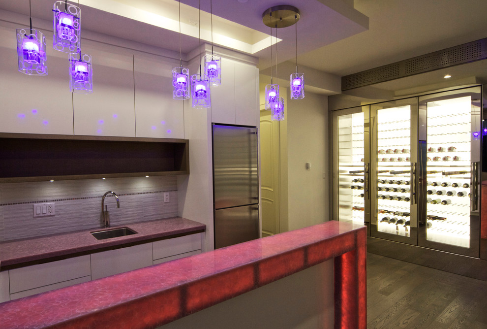 Design ideas for a mid-sized modern wine cellar in Vancouver.