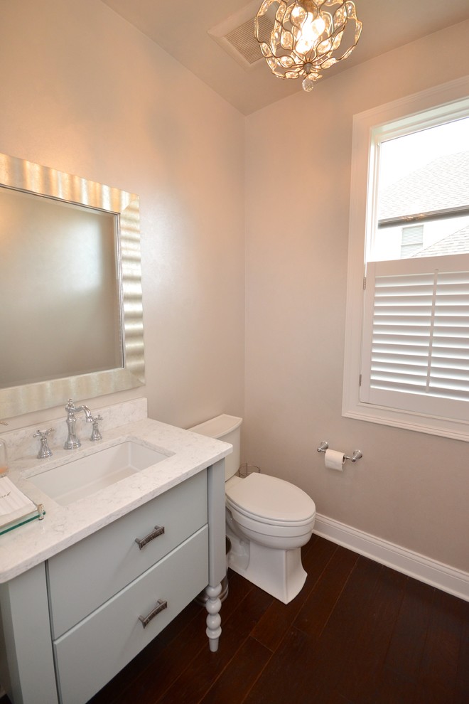 This is an example of a transitional powder room in Cincinnati.