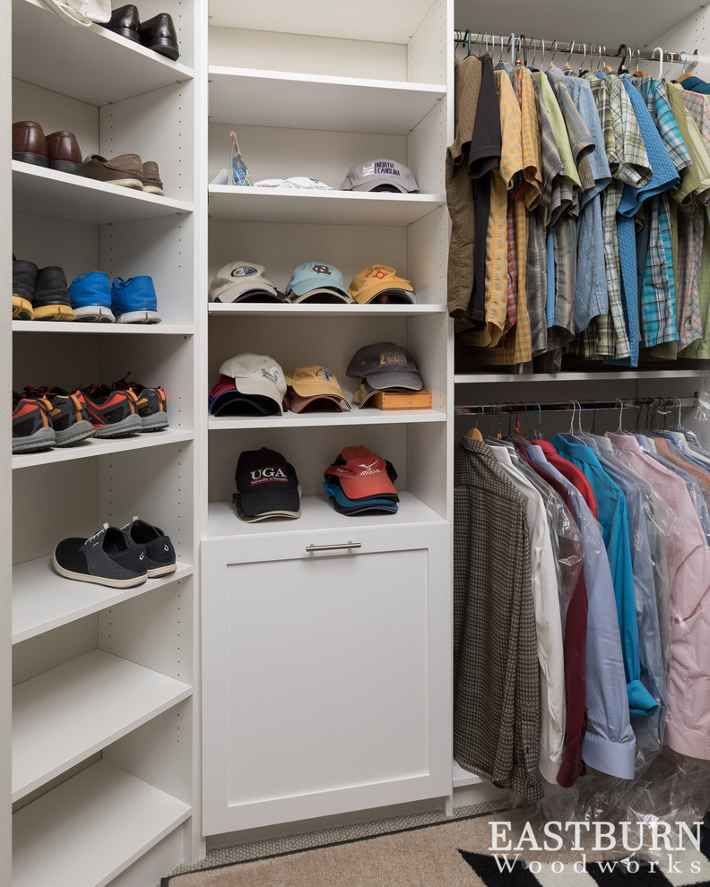 Large elegant women's carpeted walk-in closet photo in Other with shaker cabinets and white cabinets