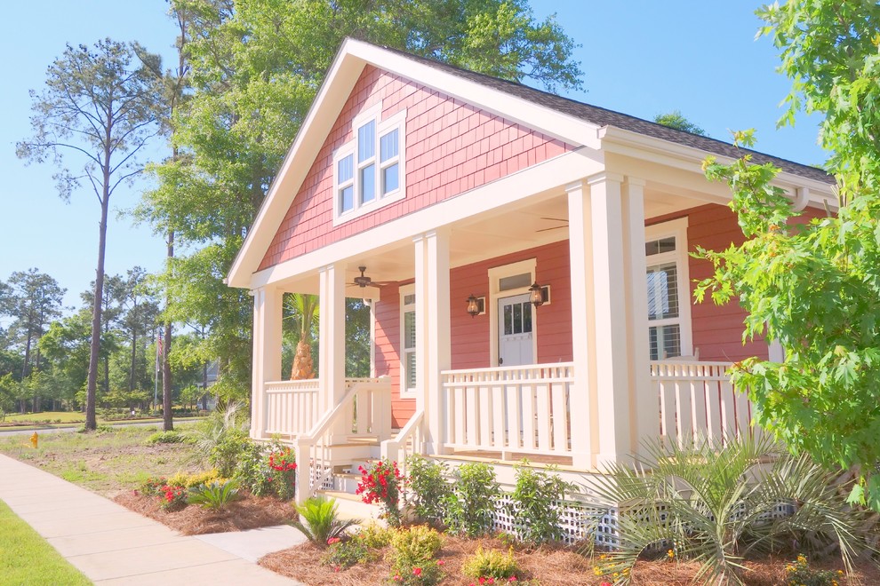 Design ideas for a small beach style one-storey red exterior in Wilmington with wood siding and a gable roof.
