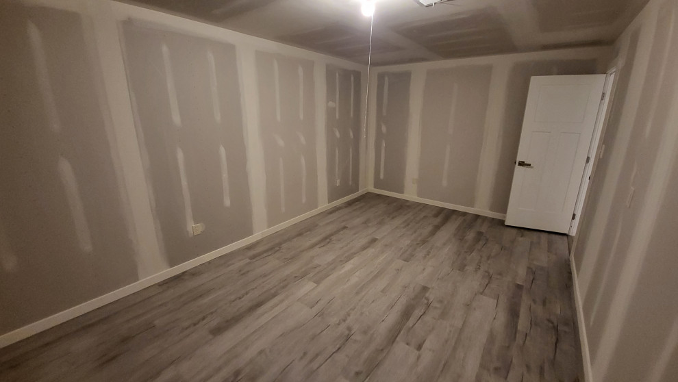 frame hang a finish and flooring basement