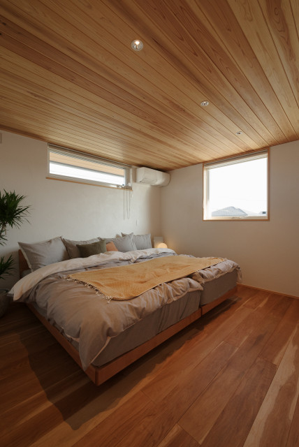 緑と暮らす 無垢と漆喰の家 minimalistisch-schlafzimmer