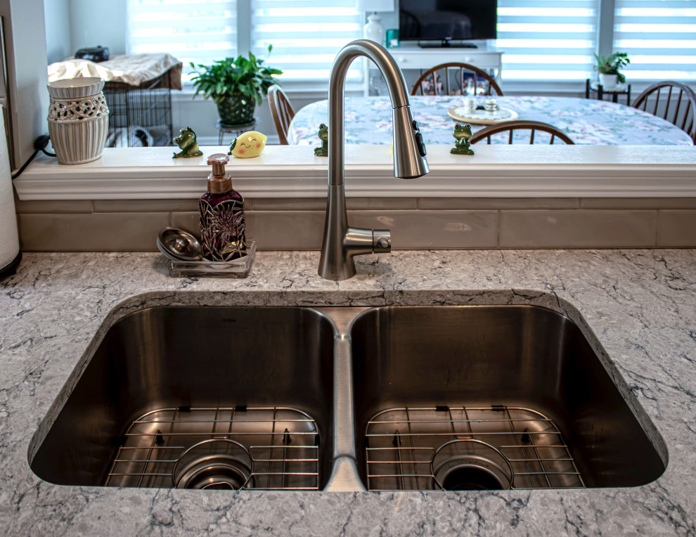 White Shaker Kitchen w/ Pietra Quartz Countertop and Gray Subway Tile ...
