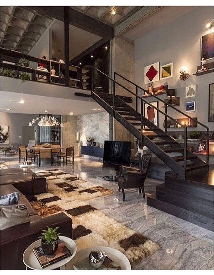 Photo of an expansive contemporary loft-style living room in Toronto with a home bar, grey walls and marble floors.