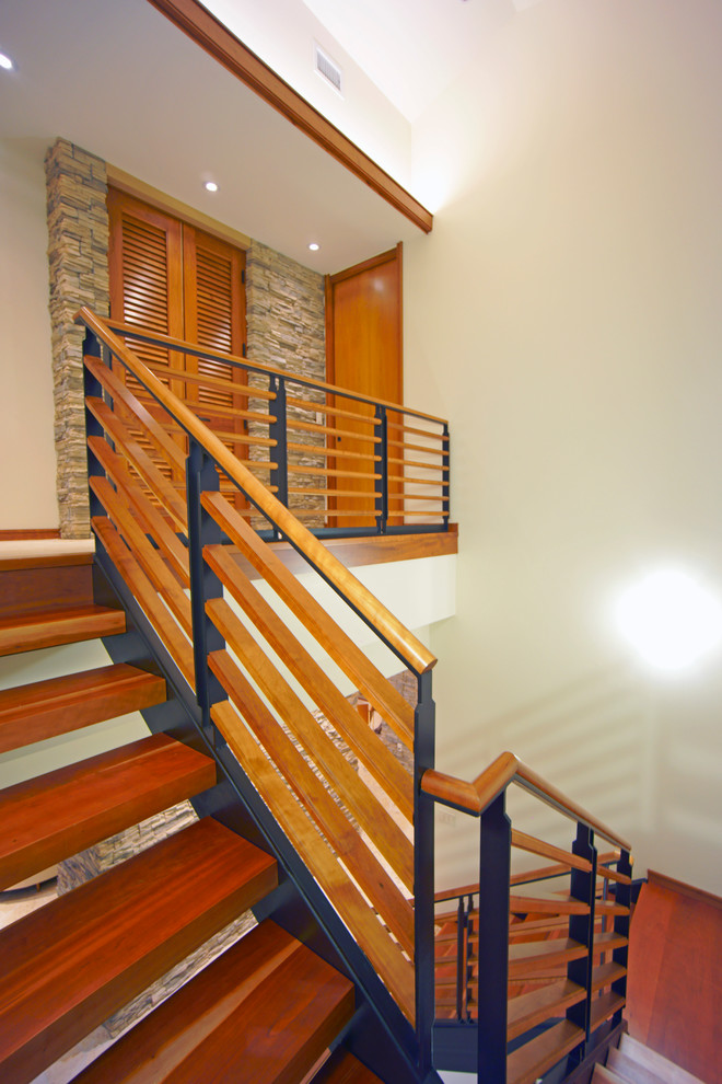 Large midcentury wood u-shaped staircase in Tampa with open risers.