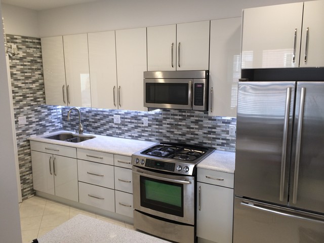Custom Kitchen In White Acrylic Cabinets And Whitney Cambria