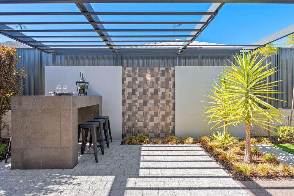 Inspiration for a contemporary backyard patio in Perth with a pergola.