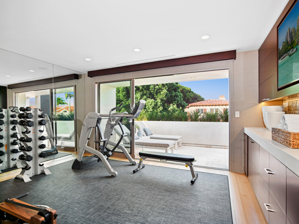 This is an example of a tropical home gym in Orange County.