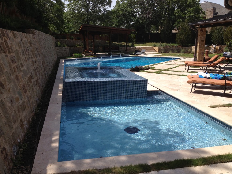 Hot tub - mid-sized transitional backyard concrete and custom-shaped hot tub idea in Dallas