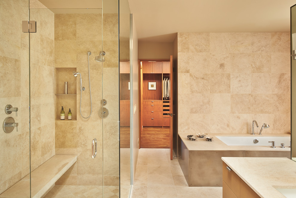 Inspiration for a large contemporary master bathroom in Seattle with an undermount tub, beige tile, beige walls, an undermount sink and medium wood cabinets.