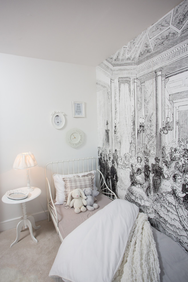 Inspiration for a traditional kids' bedroom for kids 4-10 years old and girls in Manchester with carpet, white walls and beige floor.