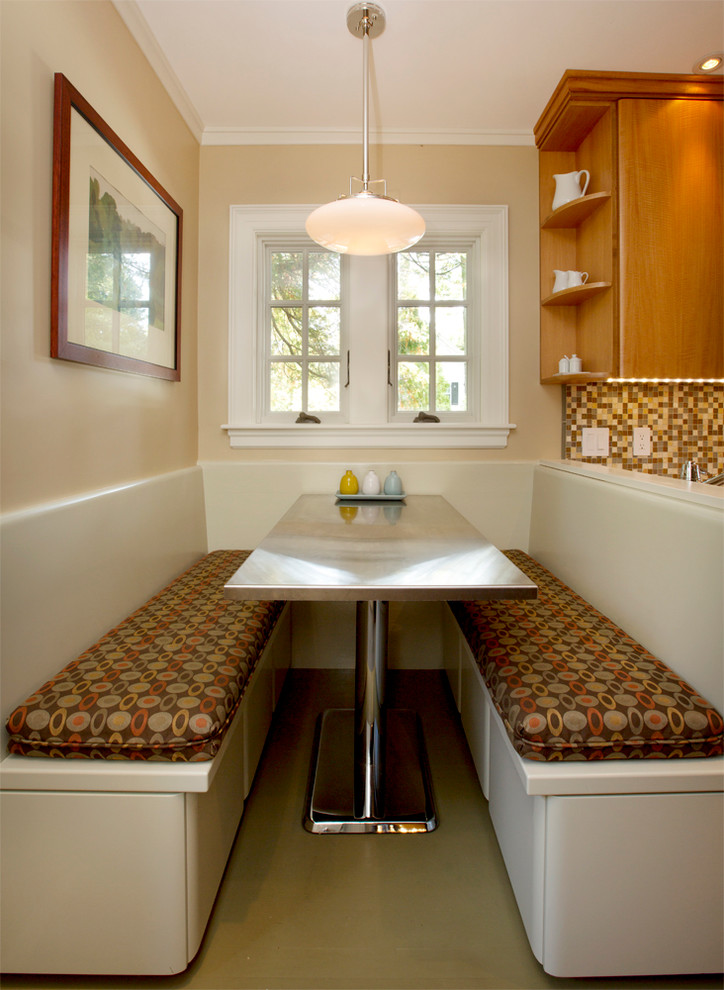 Photo of a transitional kitchen/dining combo in Boston with beige walls.