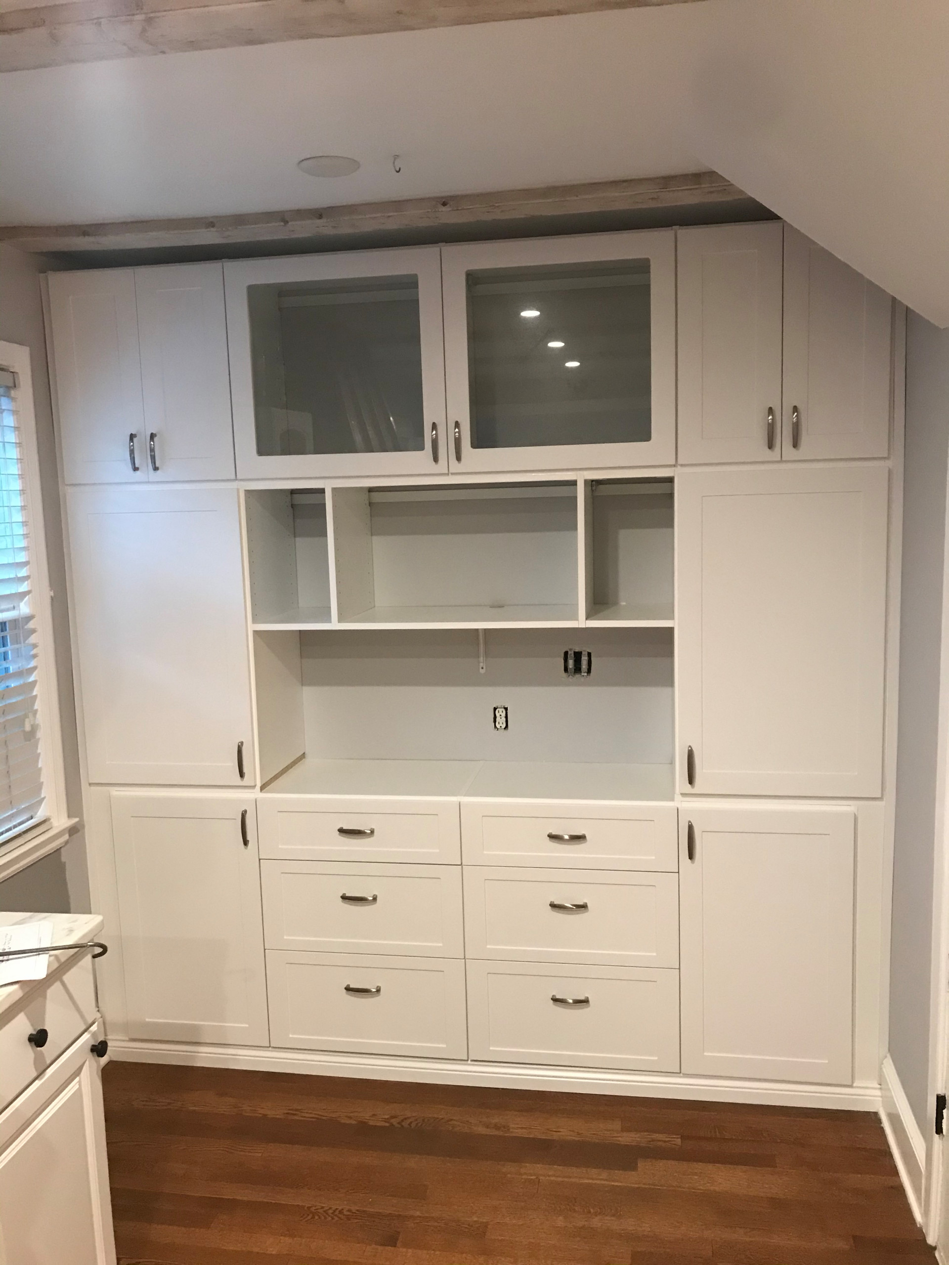 Built-in Bar with Glass Doors and Counter Space