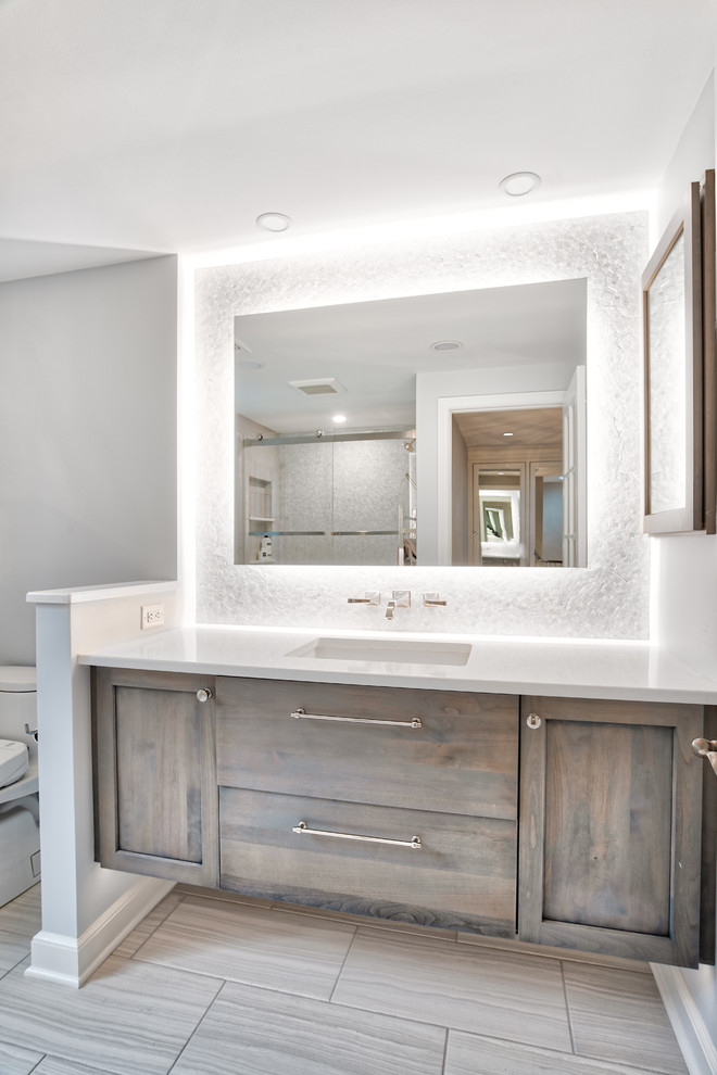 Inspiration for a mid-sized transitional kids bathroom in New York with shaker cabinets, a drop-in tub, a shower/bathtub combo, a two-piece toilet, mosaic tile, purple walls, an undermount sink, a sliding shower screen and white benchtops.