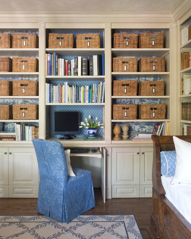 Design ideas for a traditional home office in Wichita with a built-in desk.