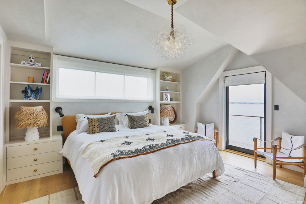 Photo of a beach style master bedroom in New York.