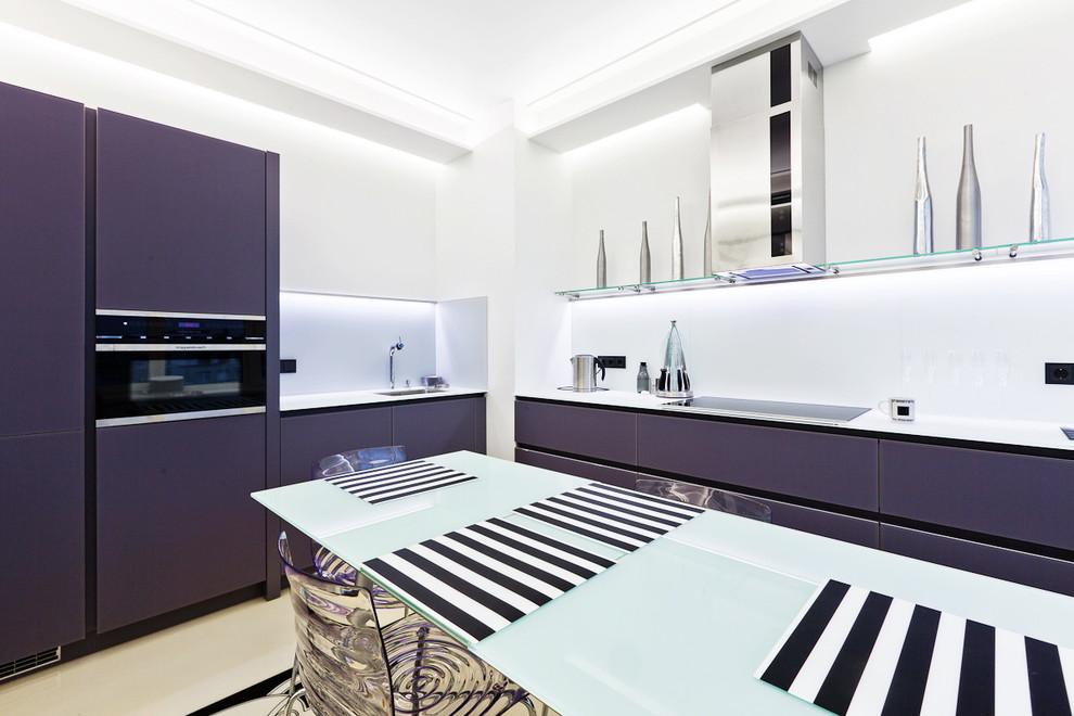 Photo of a mid-sized contemporary l-shaped eat-in kitchen in Saint Petersburg with flat-panel cabinets, white splashback, black appliances and no island.