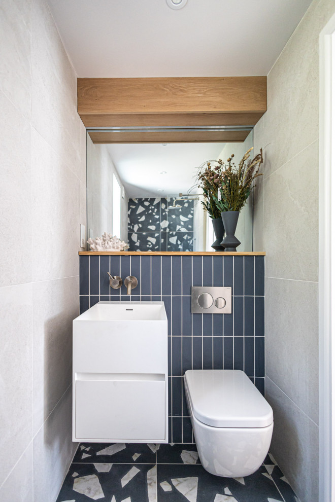 Photo of a beach style powder room in Dorset.