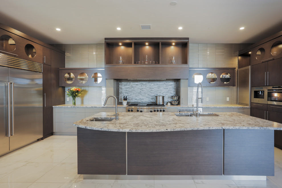 Inspiration for a mid-sized contemporary u-shaped open plan kitchen in Calgary with flat-panel cabinets, brown cabinets, granite benchtops, an undermount sink, beige splashback, glass tile splashback, stainless steel appliances, porcelain floors and with island.
