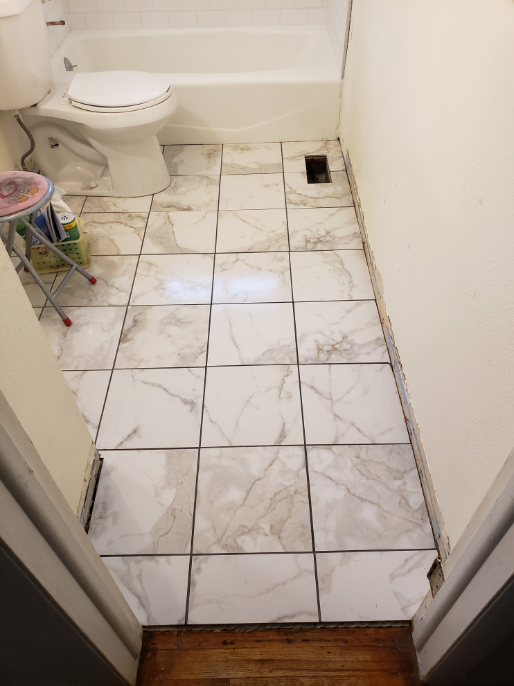 A Touch of Tradition with Subway Tile and a Calacatta Charm Floor