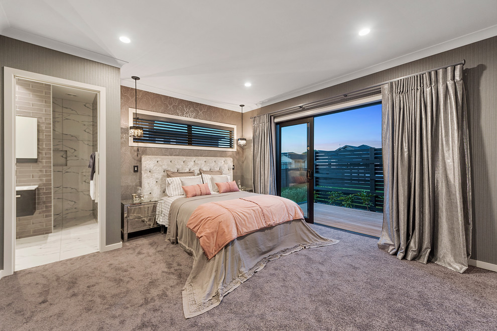 This is an example of a large contemporary master bedroom in Hamilton.