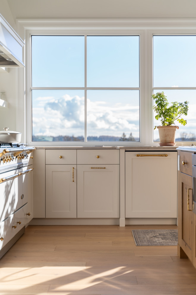Example of a transitional kitchen design in Vancouver