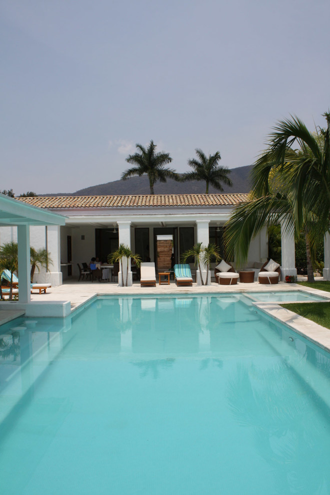 Expansive mediterranean rectangular pool in Mexico City.