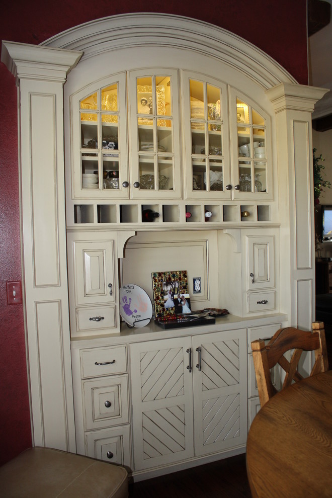 Photo of a large traditional single-wall wet bar in Other with no sink, raised-panel cabinets, white cabinets and dark hardwood floors.