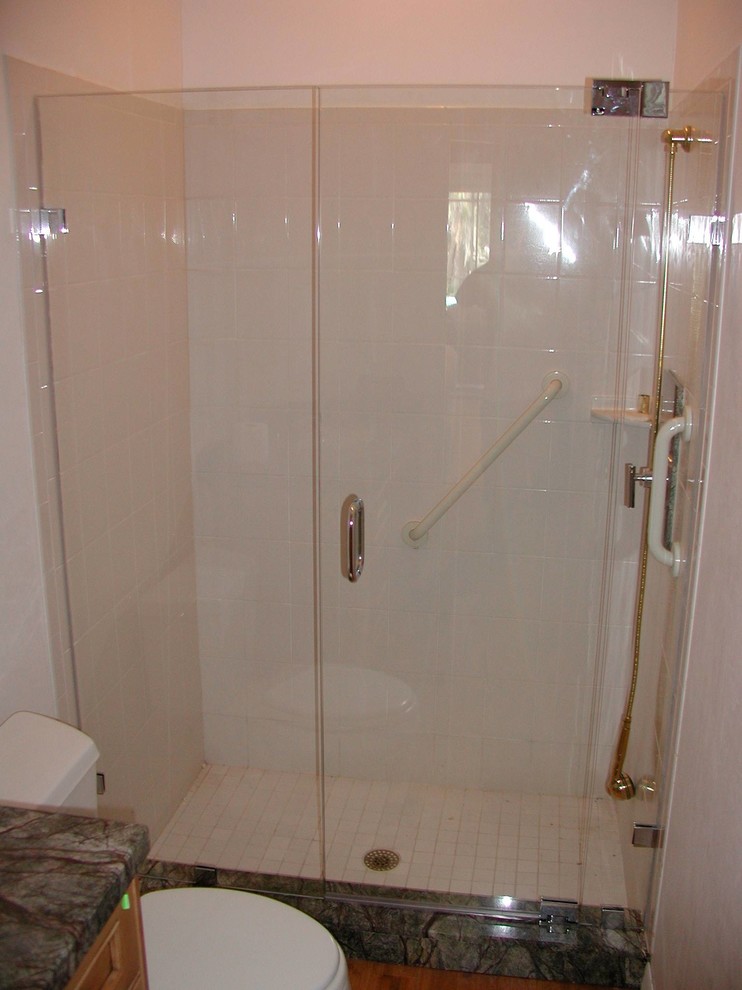 Inspiration for a transitional 3/4 beige tile and ceramic tile ceramic tile and beige floor alcove shower remodel with beige walls and a hinged shower door
