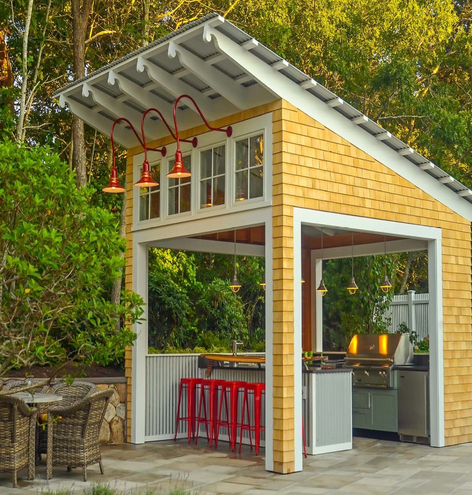 Example of a transitional home design design in Boston