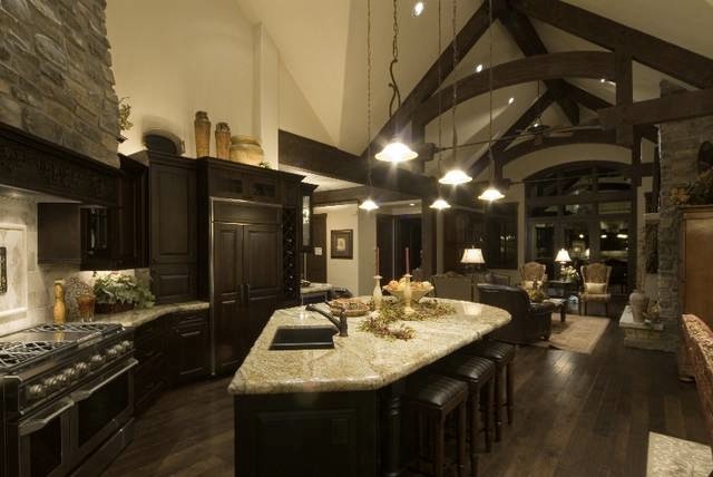 Example of a mountain style kitchen design in Denver with an island