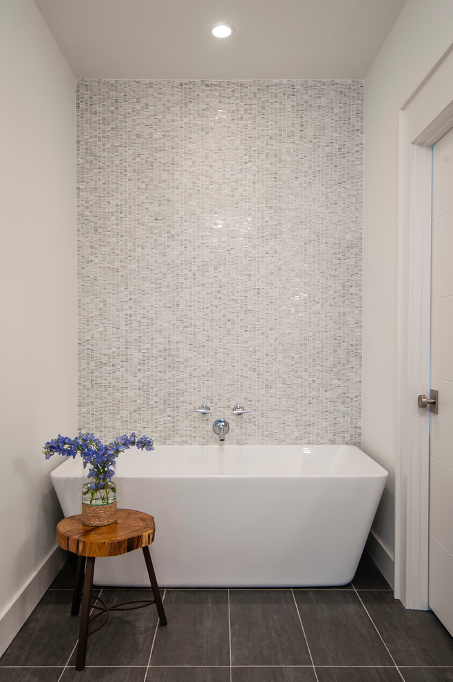 Transitional bathroom in Dallas with a freestanding tub, white tile, mosaic tile and white walls.