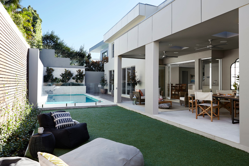 Inspiration for a mid-sized contemporary backyard patio in Sydney with no cover and an outdoor kitchen.