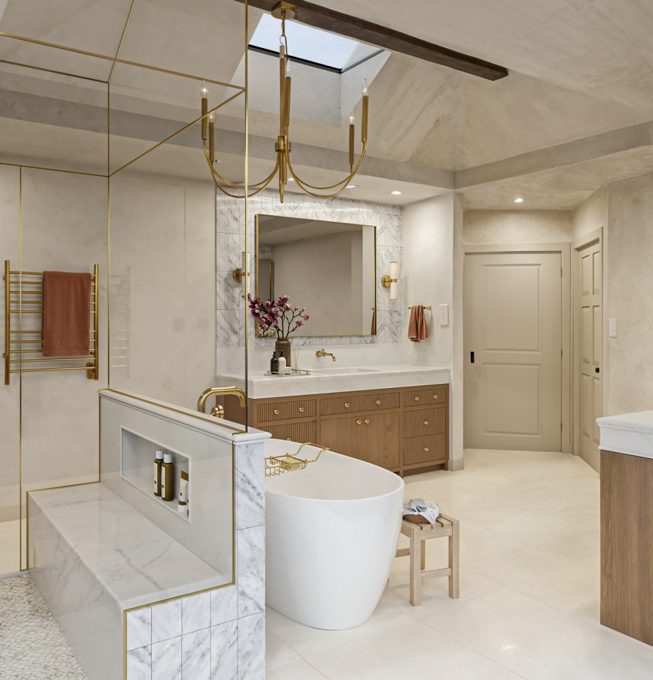 A Marble-Clad Spa Bath with Pinky’s Arched Steel Door