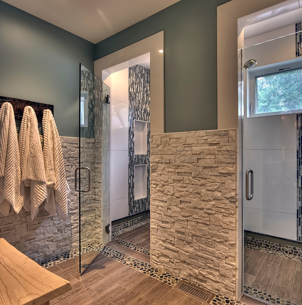 Photo of a transitional bathroom in Seattle with matchstick tile.