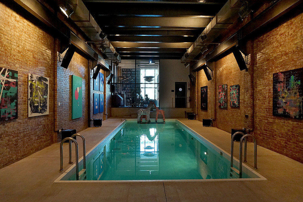 This is an example of a small industrial indoor rectangular pool in New York with a pool house.